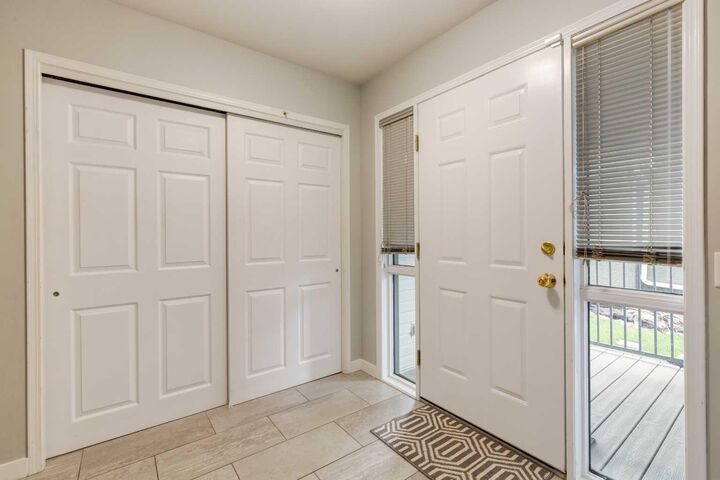 Property Photo:  128 Riverwood Close SE  AB T2C 3Z6 
