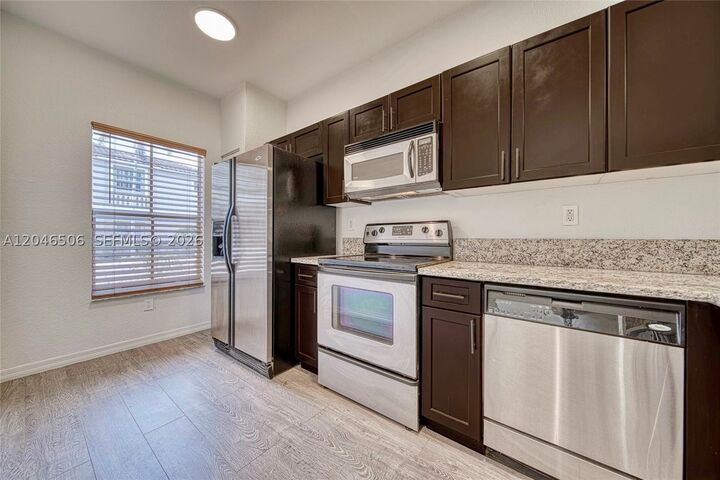 Property Photo:  14033 SW 49th St 6  FL 33027 
