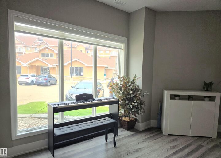 Property Photo: 4312 139 Avenue NW 104 AB T6T 1E7