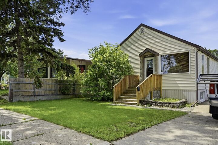 Property Photo: 11918 47 Street NW AB T5W 2X1