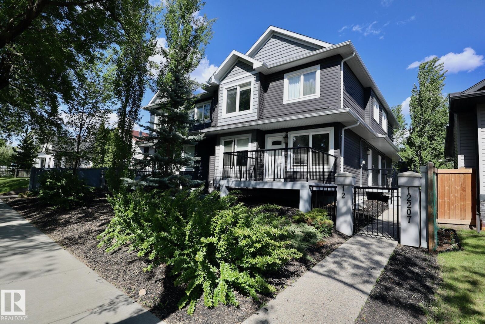 Property Photo:  12207 96 Street NW 1  AB T5G 1W2 