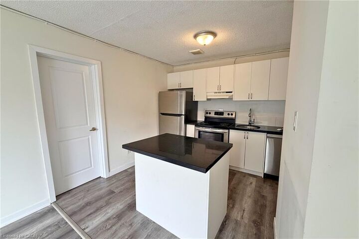 Property Photo: 120 Charles Street 3 ON L8P 3E6