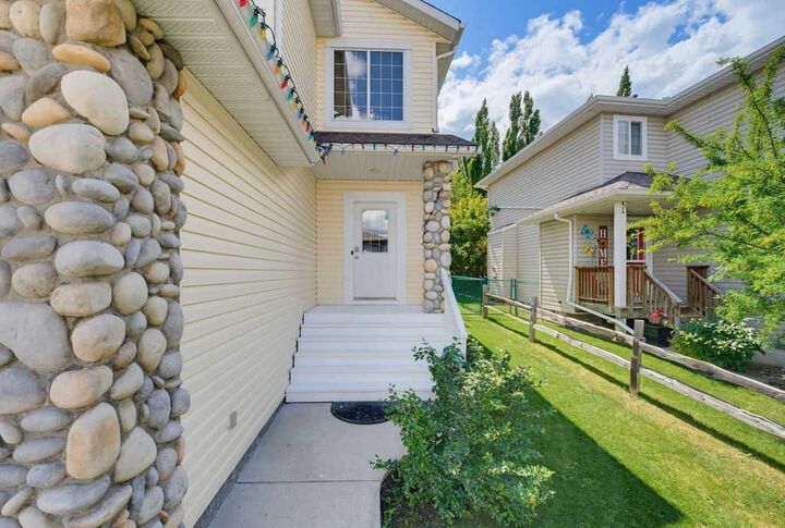 Property Photo: 11 Bow Ridge Link AB T4C 1V7