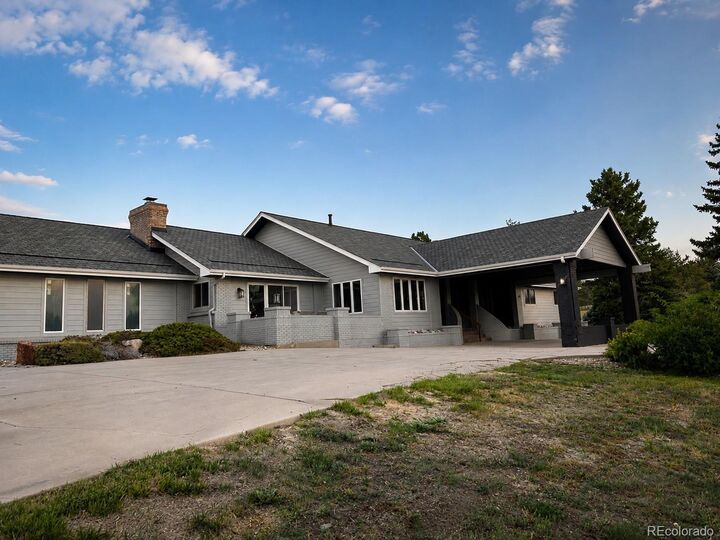 Property Photo: 7630 S Dunkirk Street CO 80016