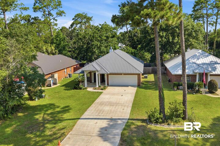 Property Photo:  410 Dolphin Avenue  AL 36542 