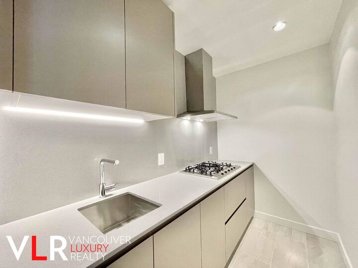 Property Photo:  6688 Pearson Way 1004  BC V7C 0E5 