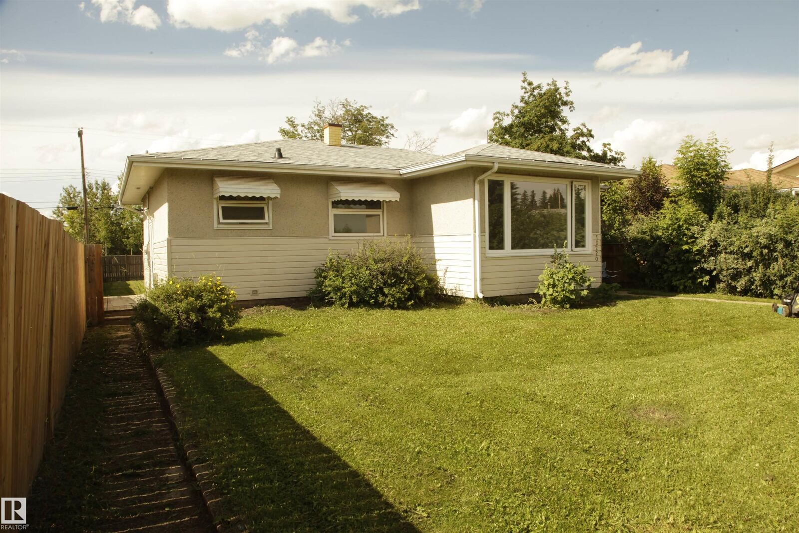 Property Photo: 10220 107 Street AB T7P 1X4