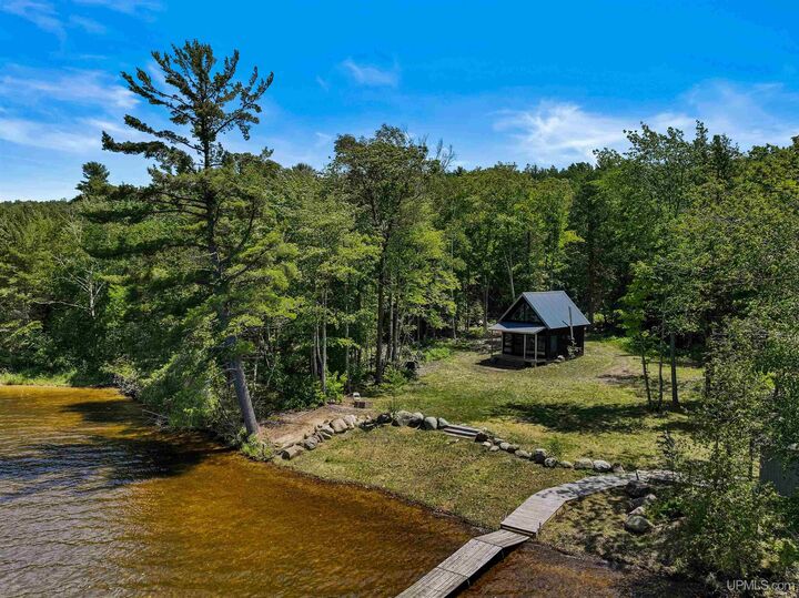 Property Photo:  25160 Upper Point Mills (Waterfont Listing) Road  MI 49930 