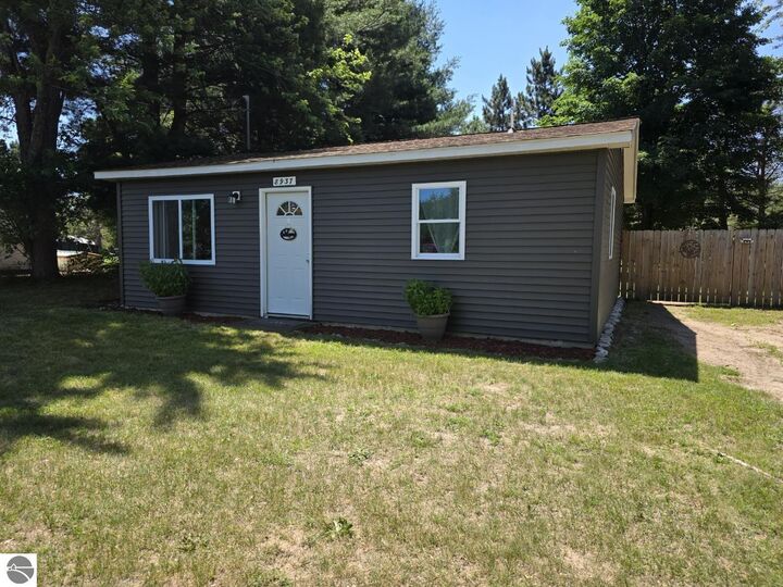 Property Photo:  8937 Valley Road, NW  MI 49646 