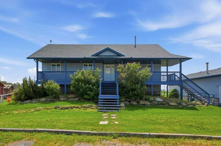 Property Photo: 270127 Glenmore Trail AB T0J 1X0