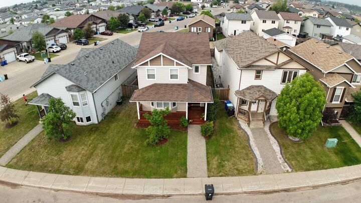 Property Photo:  104 Walnut Crescent  AB T9K 0N6 