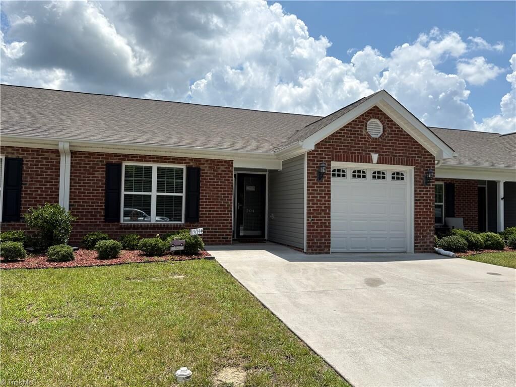 Property Photo:  204 Oak Ridge Drive  NC 27263 