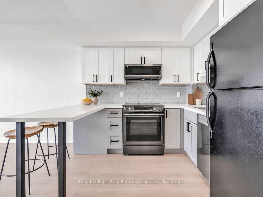 Property Photo: 4 Elsinore Path 706 ON M8V 4G7