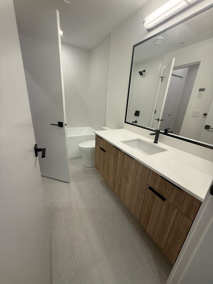 Property Photo: 14398 60 Ave Street 213 BC V3X 2N5
