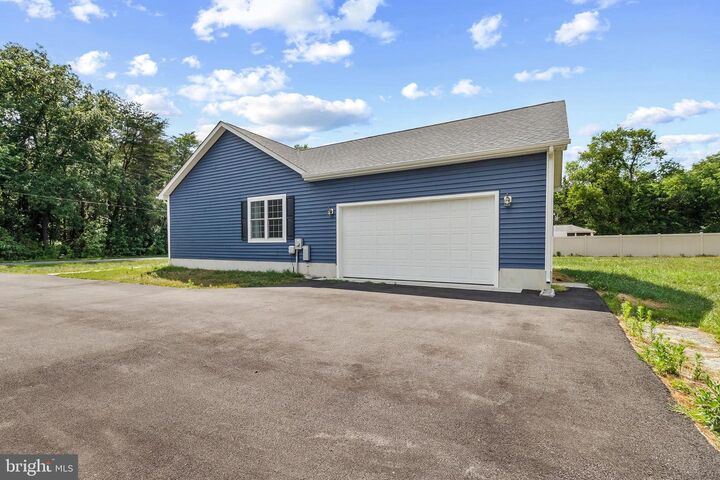 Property Photo: 22271 Cubbage Pond Road DE 19960