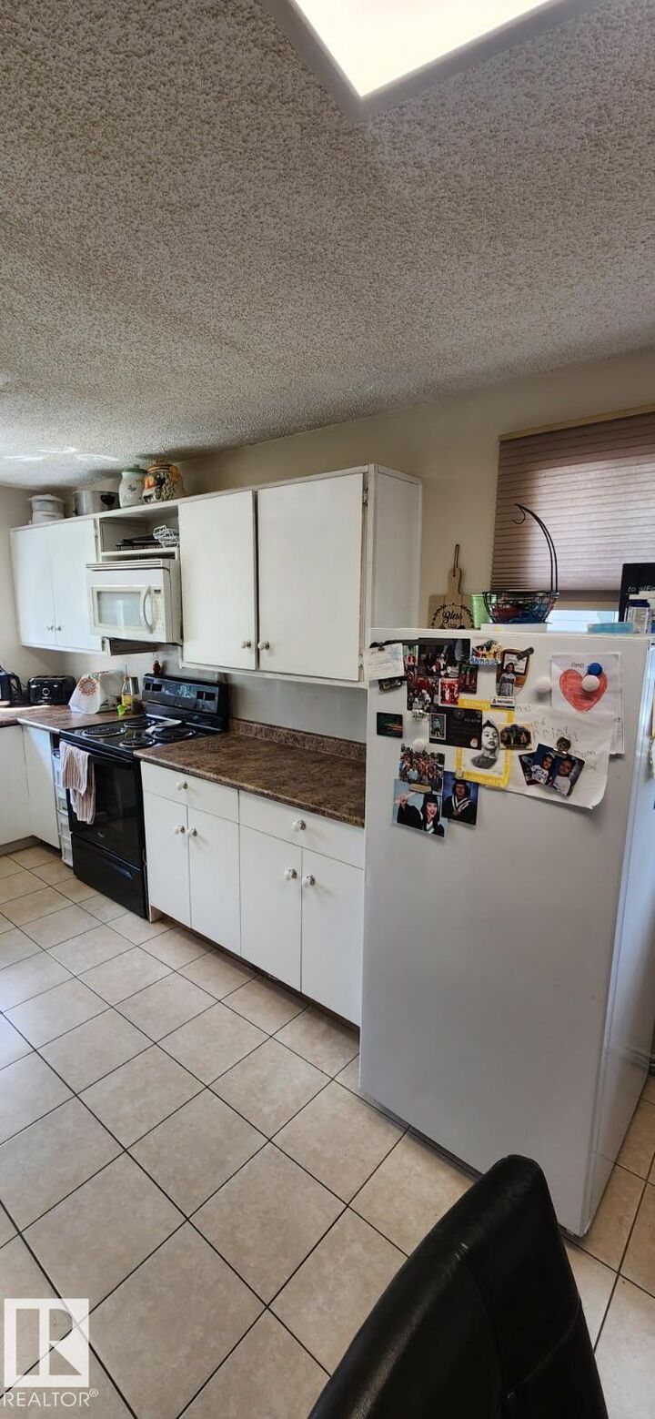 Property Photo: 14411 31 Street NW AB T5Y 1Z1