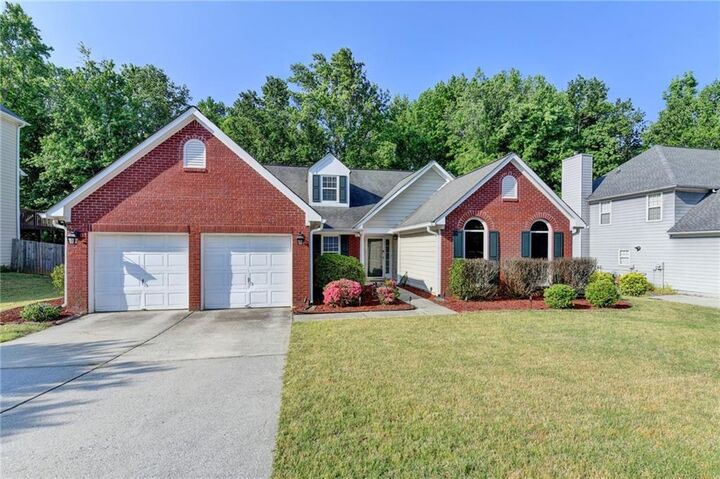 Property Photo:  1396 Belfaire Trace  GA 30019 
