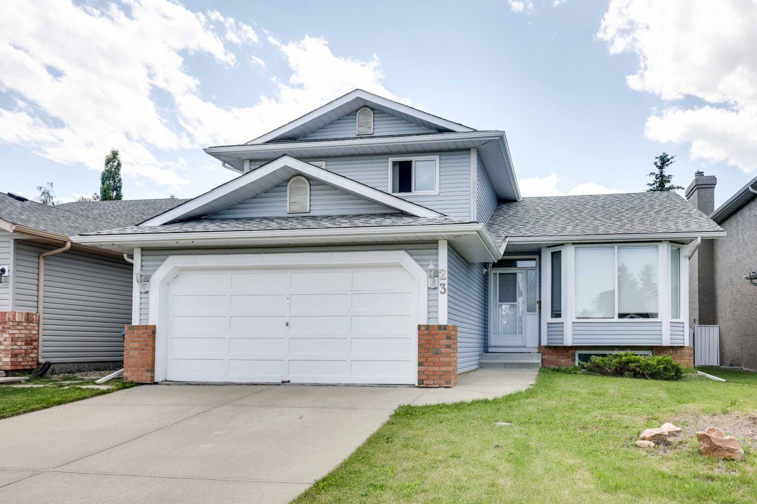 Property Photo: 23 Sandalwood Close NW AB T3K 4B4