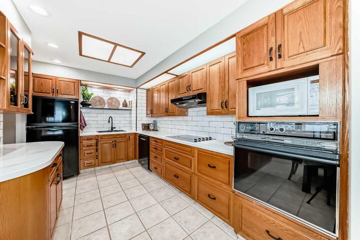 Property Photo:  8043 Elbow Drive SW  AB T2V 1K5 