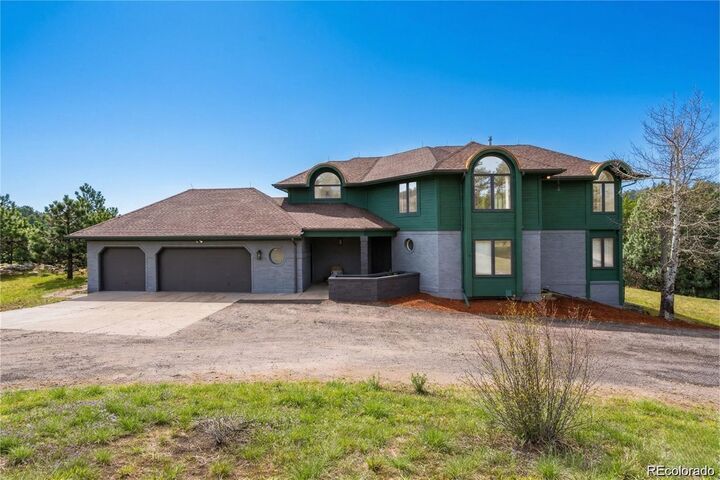 Property Photo:  22196 Boar Head Road  CO 80454 