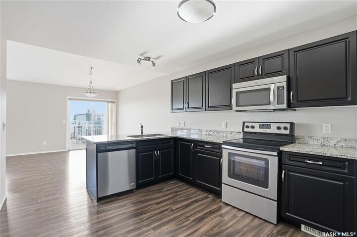 Property Photo:  100 Chaparral Boulevard 331  SK S0K 0A2 