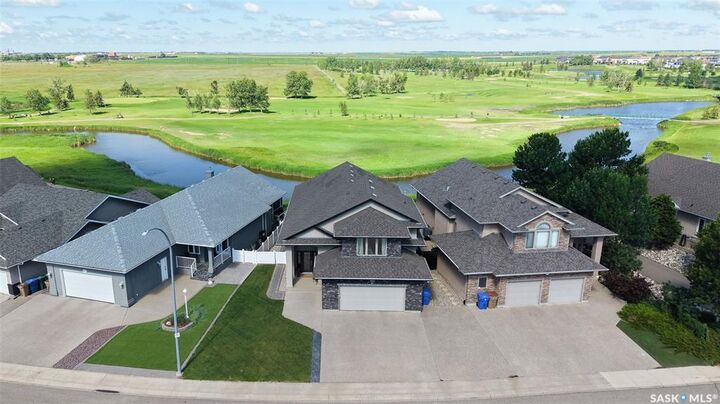 Property Photo:  8095 Fairways West Drive  SK S4Y 0A4 