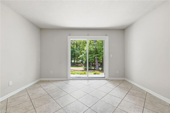 Property Photo:  5611 Hornaday Road K  NC 27409 