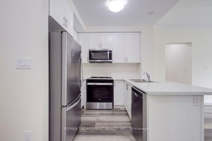 Property Photo: 450 Dundas Street E 110 ON L8B 0L7