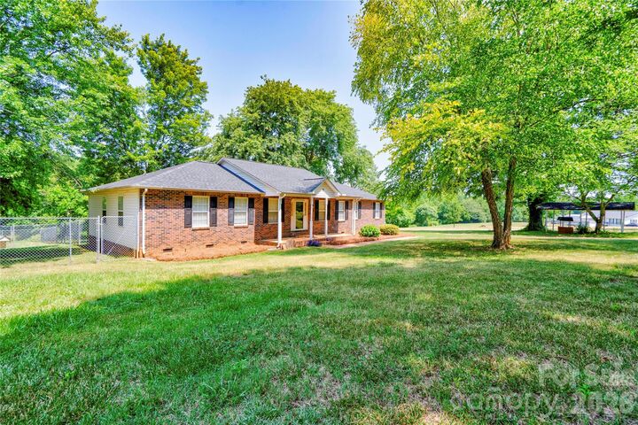 Property Photo:  5573 Lennox Drive  NC 28086 