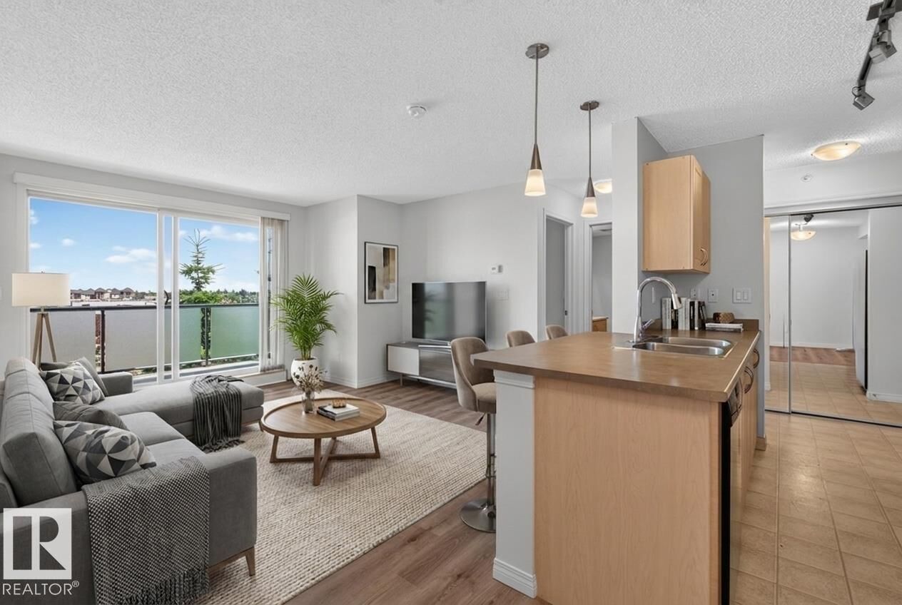 Property Photo:  13907 136 Street NW 405  AB T6V 1Y5 