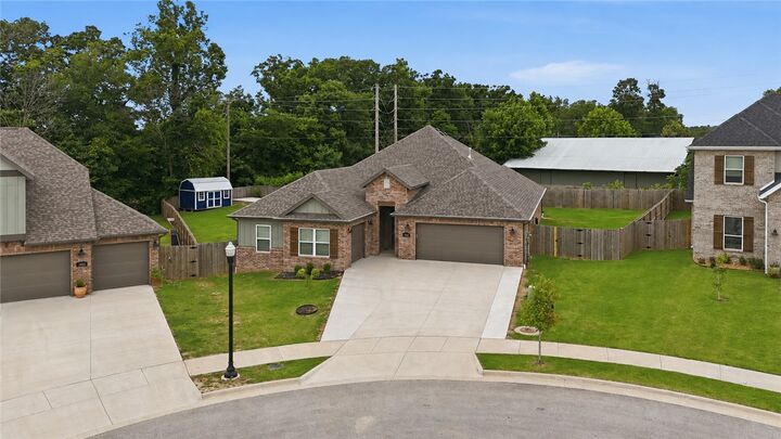 Property Photo:  3800 SW Pinecrest Drive  AR 72713 