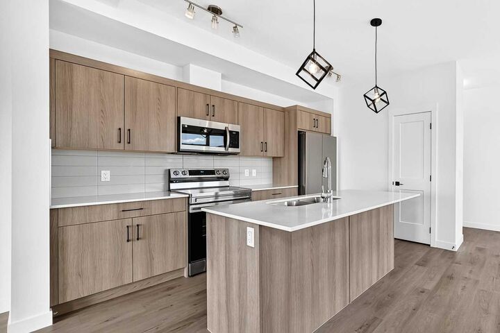 Property Photo: 55 Lucas Way NW 3101 AB T3P 2C7
