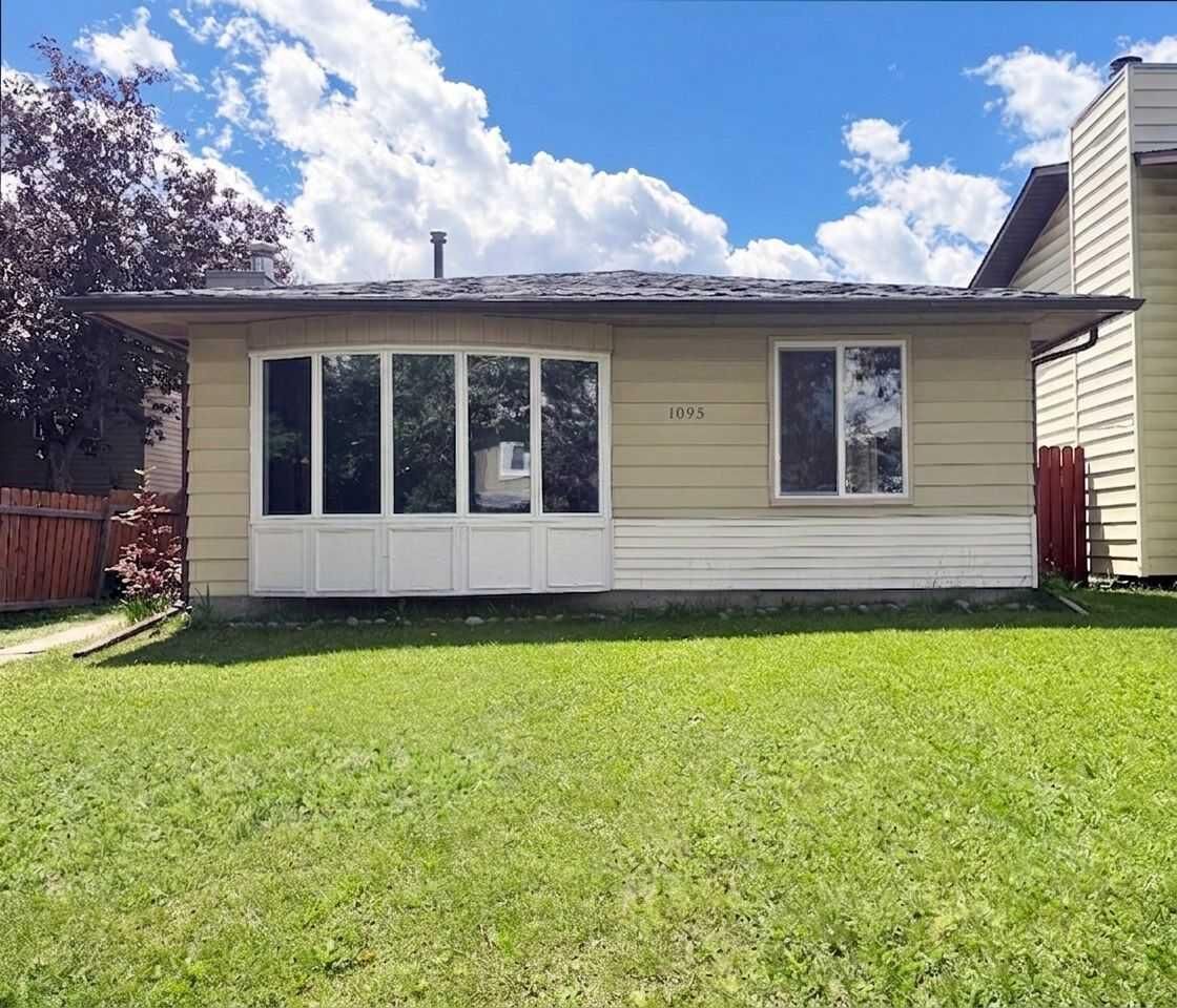 Property Photo: 1095 Berkley Drive NW AB T3K 1S6