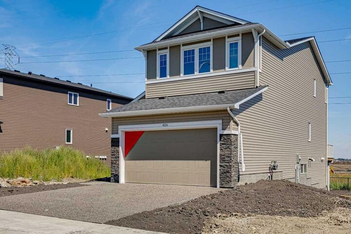 Property Photo: 426 Hotchkiss Manor SE AB T3S 0J9