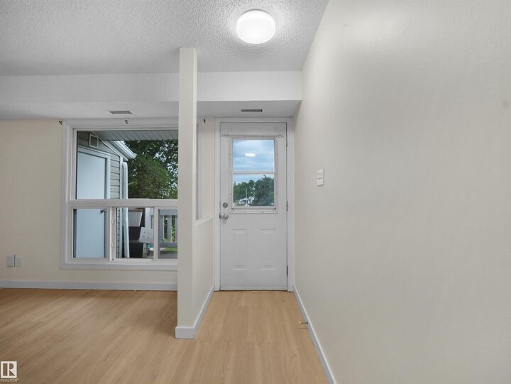 Property Photo: 2703 79 Street NW 168 AB T6K 3Z6