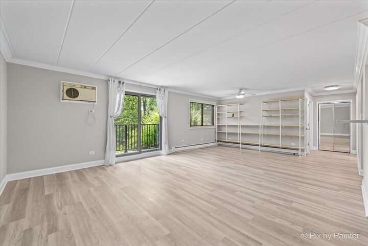 Property Photo: 1220 S Lorraine Road 2H IL 60189