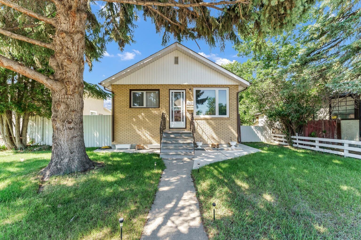 Property Photo: 162 2 Street NE AB T1A 5K9