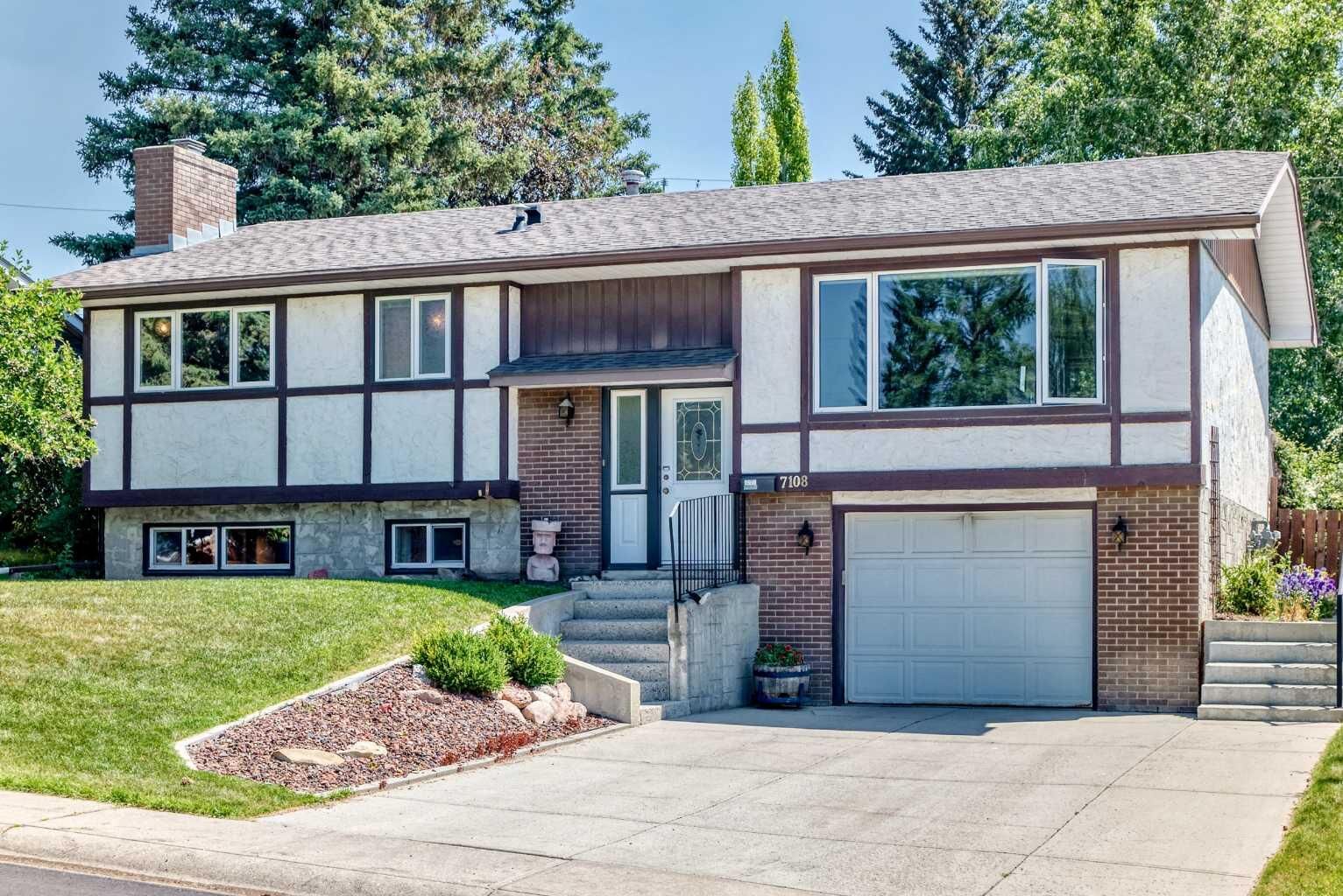 Property Photo: 7108 Silverview Road NW AB T3B 3M1