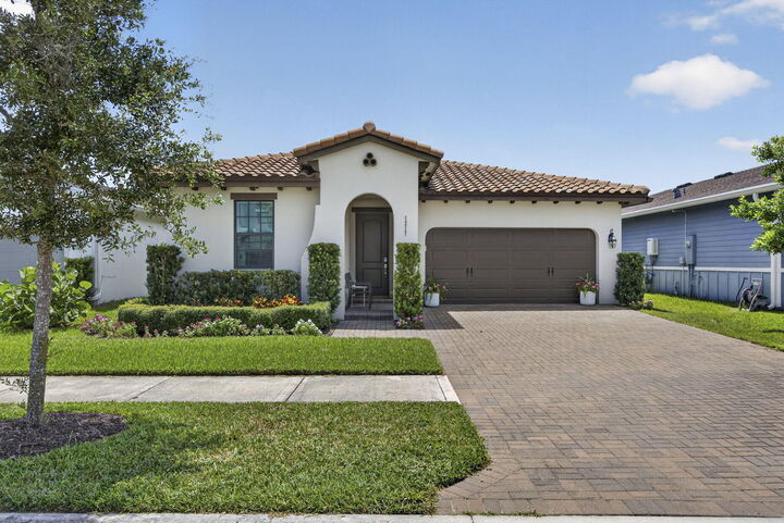 Property Photo: 1217 Wandering Willow Way FL 33470