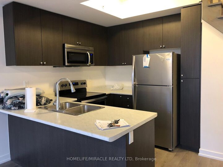 Property Photo: 1555 Kingston Road 202 ON L1V 0E9