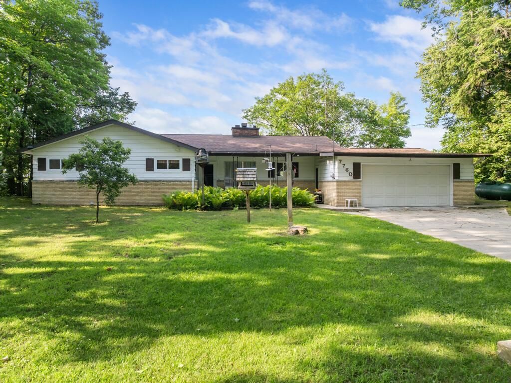 Property Photo:  7760 Paradise Trail  MI 49718 