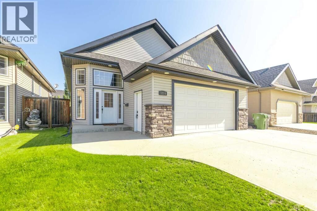 Property Photo: 5314 14 Street AB T9V 2K1
