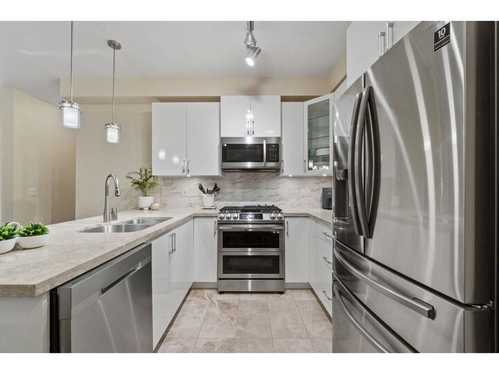Property Photo: 20376 86 Avenue 208 BC V2Y 3P8