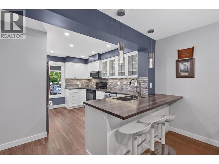 Property Photo: 3000 Richter Street 9 BC V1Y 8M5