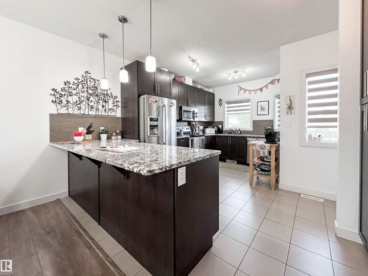 Property Photo: 150 Everitt Dr 11 AB T8N 7R8