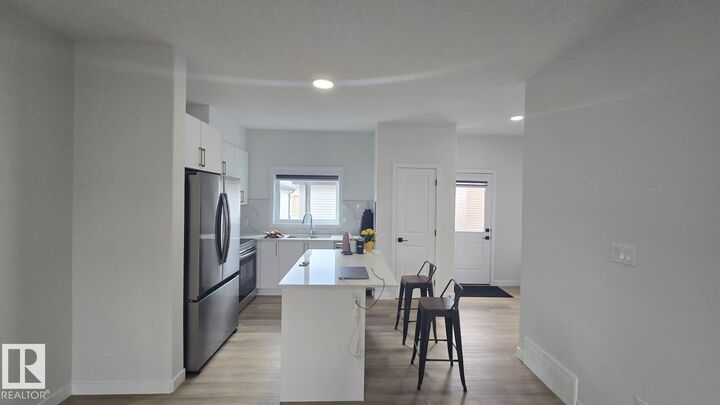 Property Photo: 336 Munn Way AB T9E 0S9