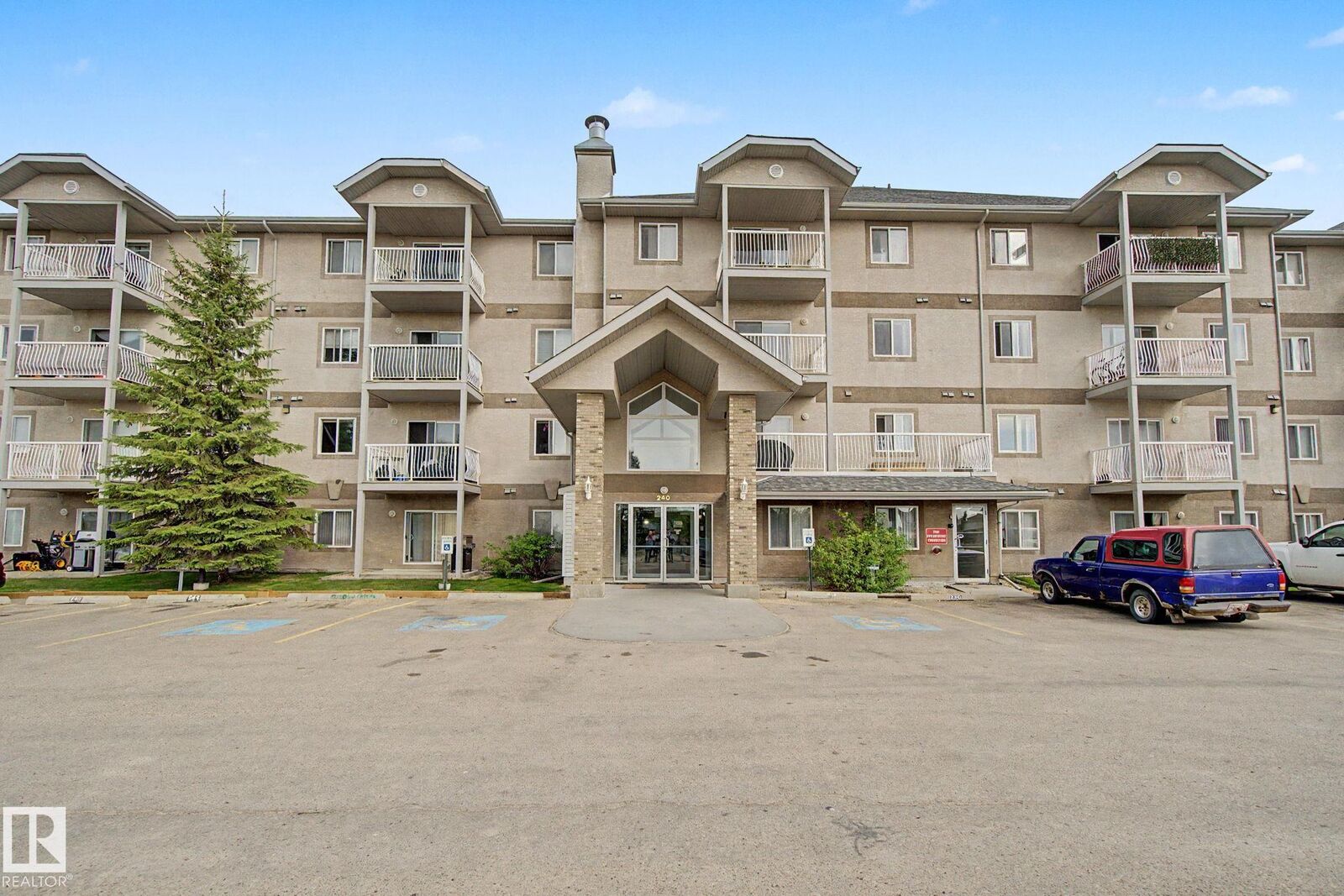 Property Photo: 240 Spruce Ridge Road 105 AB T7X 0G5