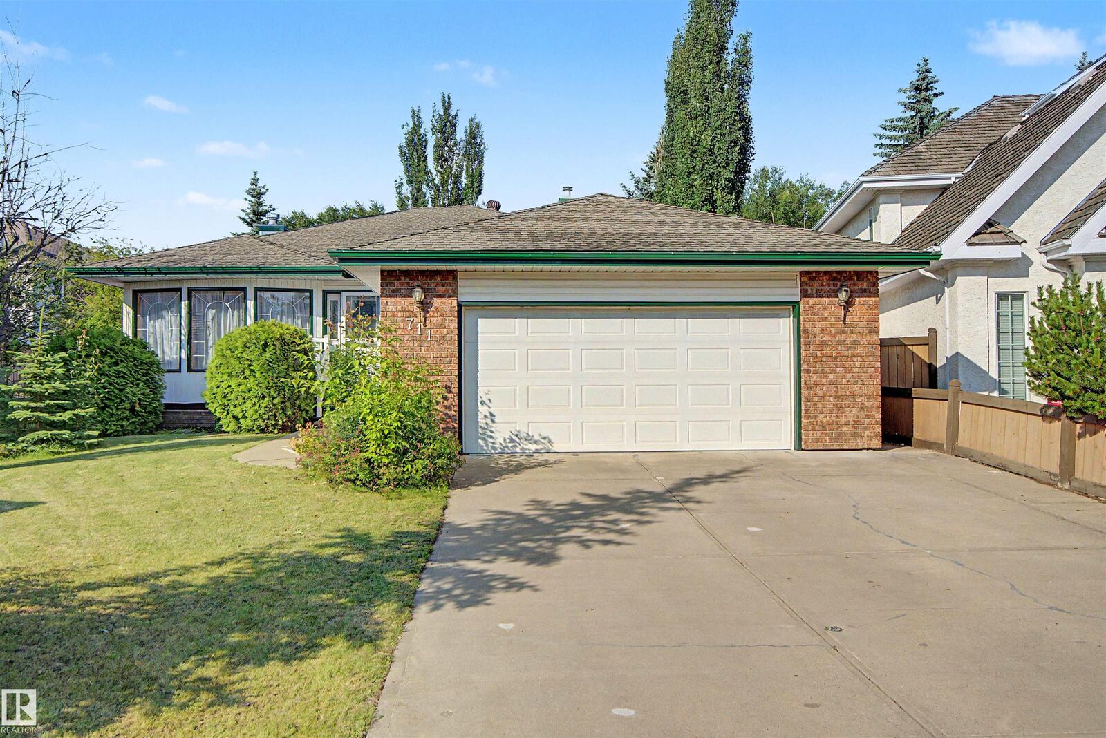 Property Photo: 711 Butterworth Drive NW AB T6R 1P5