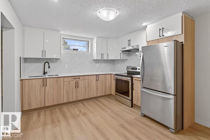 Property Photo:  12936 132 Street NW  AB T5L 1R3 