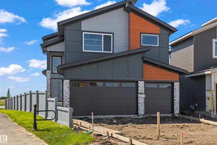 Property Photo: 22 Owl Ridge Close AB T8L 0P6